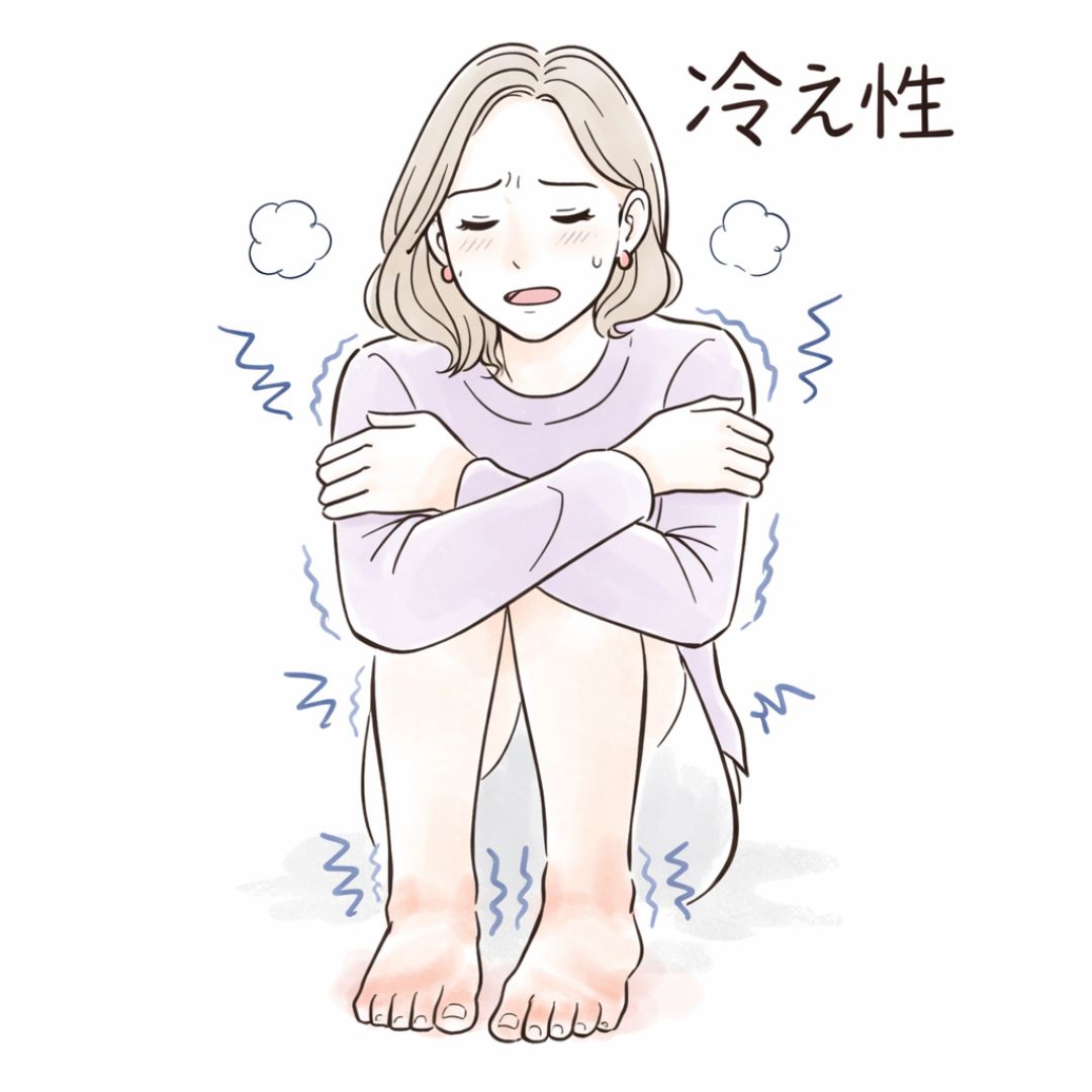 体を抱えて寒さに震える冷え性の女性を描いたイラスト